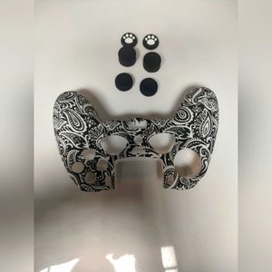 PS 4 game controller silicone cover black and white, with pawprint button covers